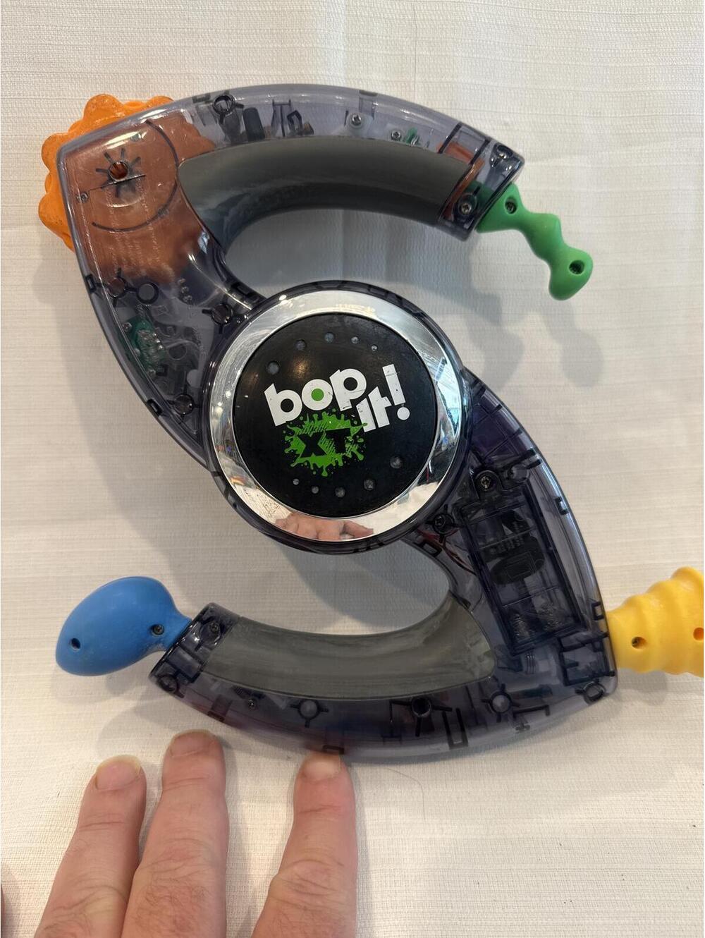 Bop It! XT Electronic Handheld Reaction Game Clear Case 90's